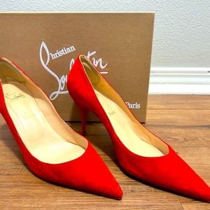 Red suede Louboutin pumps